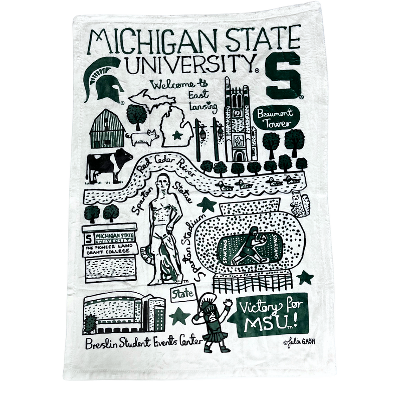 A white, plush fleece blanket measuring 30 inches wide and 40 inches high. On the blanket are multiple drawings of various Michigan State University landmarks. 