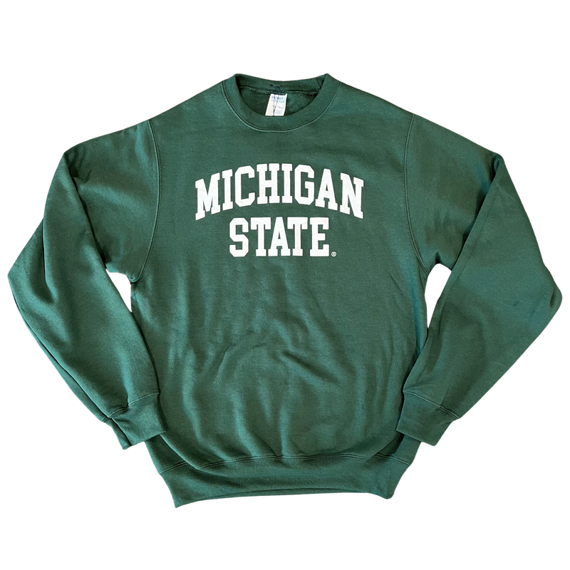 Forest green crewneck sweatshirt. Centered on the chest, white block letters "Michigan State" across two lines, where “Michigan” is slightly arched.