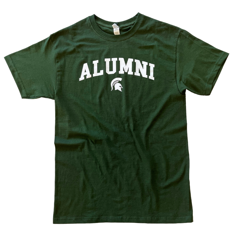 Forest green crewneck t-shirt with short sleeves. Centered on the chest, white block letters read “alumni” in a slight arch over a small white Spartan helmet.