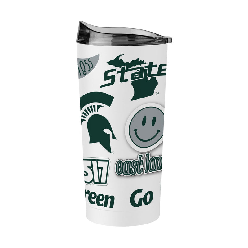 White tumbler with multiple green colored Michigan State University icons placed around it. Visible from this angle is a Spartan helmet, a smiley face, block letters reading "517", a state of Michigan with script text reading "State" overlaid, and outlined text reading "east lansing".