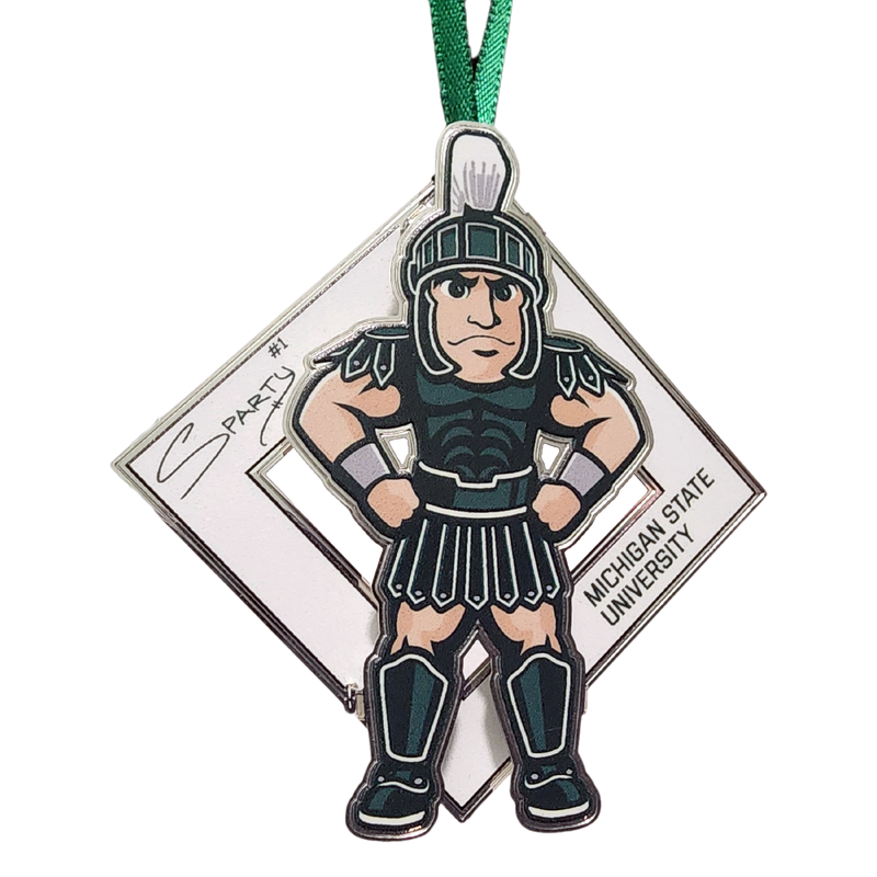 An illustration of MSU’s Sparty mascot sporting a smirk with his hands on his hips. A white diamond behind Sparty displays his "Sparty number 1" signature and athletic block letters that read Michigan State University. A green ribbon is affixed to the top of the collectible.