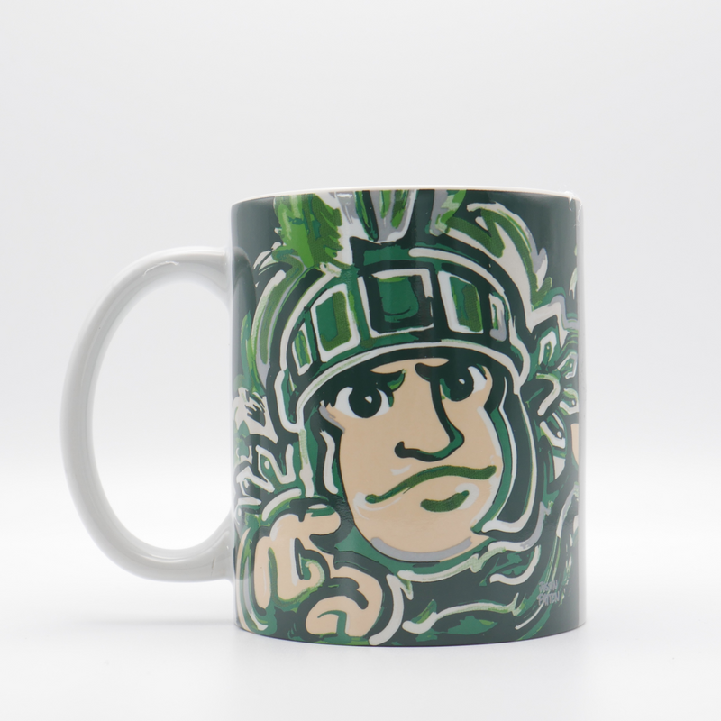 A coffee mug with a watercolor painting-style design showing Sparty, the Michigan State University mascot. 