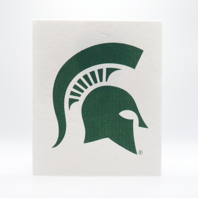 A cream re-usable absorbent square dish cloth with a dark green Michigan State spartan helmet logo in the center. 