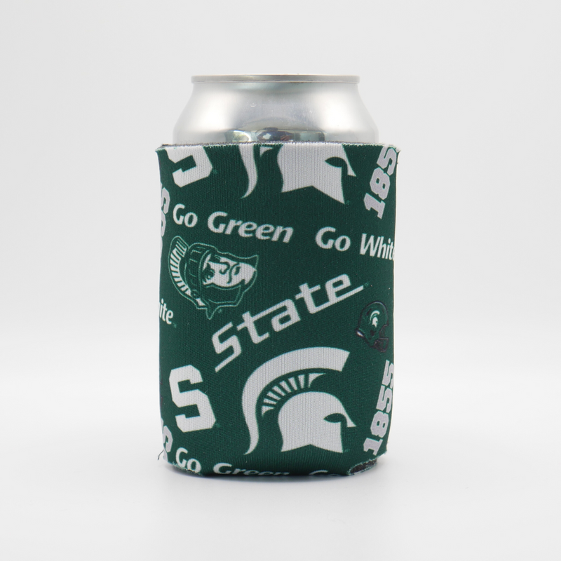 A dark green 12 fluid ounce can cooler with various Michigan State University icons printed on the side of the cooler. Icons shown include "Go Green, Go White", the block S, the MSU spartan helmet logo, 1855, Sparty, and the digital State text. 