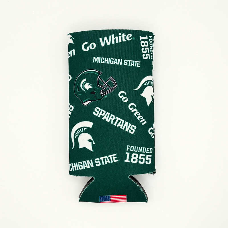 A dark green 12 fluid ounce slim can cooler with various Michigan State University icons printed on the side. The icons shown include "Go Green, Go White", "Spartans" in the MSU athletics font, A MSU green football helmet, the text "Founded 1855" and a white MSU spartan helmet logo. 