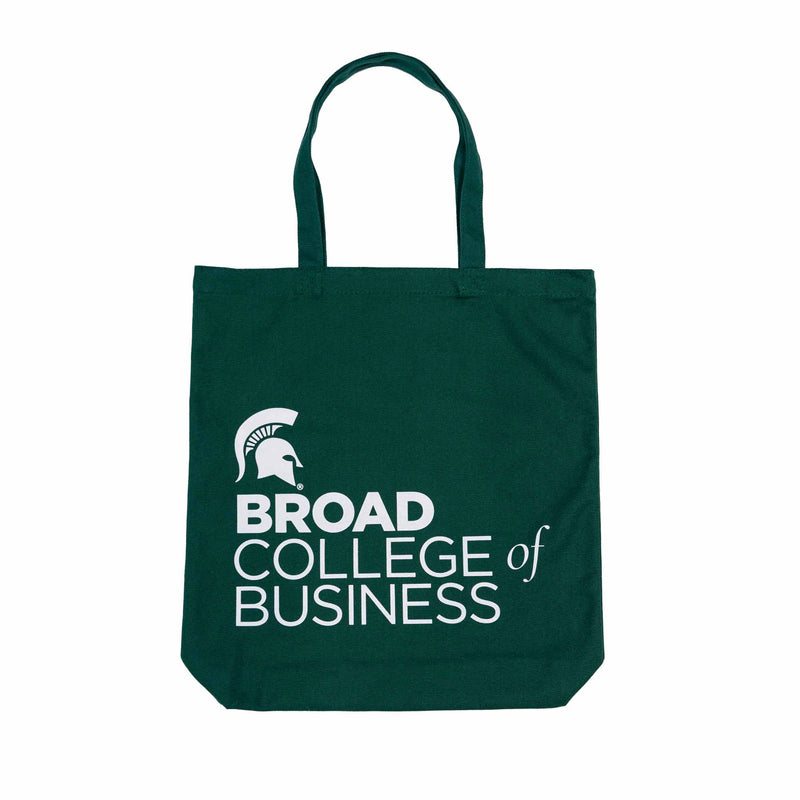 Dark green tote bag with white printing left-aligned in the bottom corner: a Spartan helmet and Broad College of Business in the college's various font format