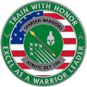 Front of the circular silver coin, with a green enamel ring reading "Train with honor, excel as a warrior leader. The inside background is an American flag with an overlay of the AFROTC detachment 380 logo