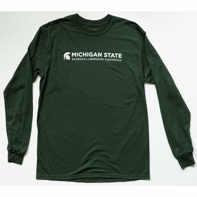 Forest green crewneck t-shirt with long sleeves. Across the center chest is text on two lines reading Michigan State (in bold) and Biomedical Laboratory Diagnostics. To the left of the text is a white Spartan helmet.