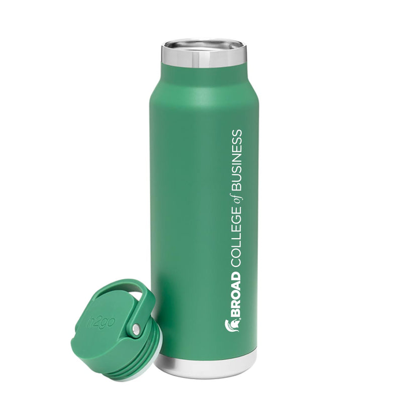 This green premium bottle has the Broad College of Business insignia running vertically up the side. Screw cap lid is leaning against the bottle