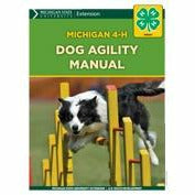 Cover of a manual titled "Michigan 4-H Dog Agility Manual". The cover includes a picture of a black and white dog jumping over an obstacle in an agility course. 