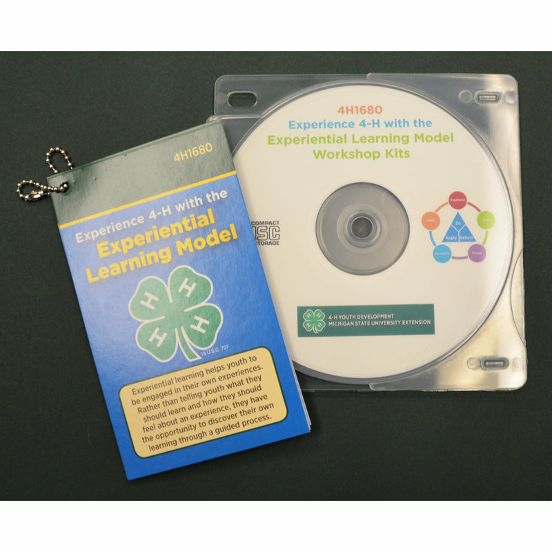 A CD titled "Experiential Learning Model Workshop Kits" sitting alongside the Experiential Learning Model pocket card pack. 