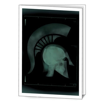 Folded notecard with an x-ray graphic of a head wearing a Spartan helmet