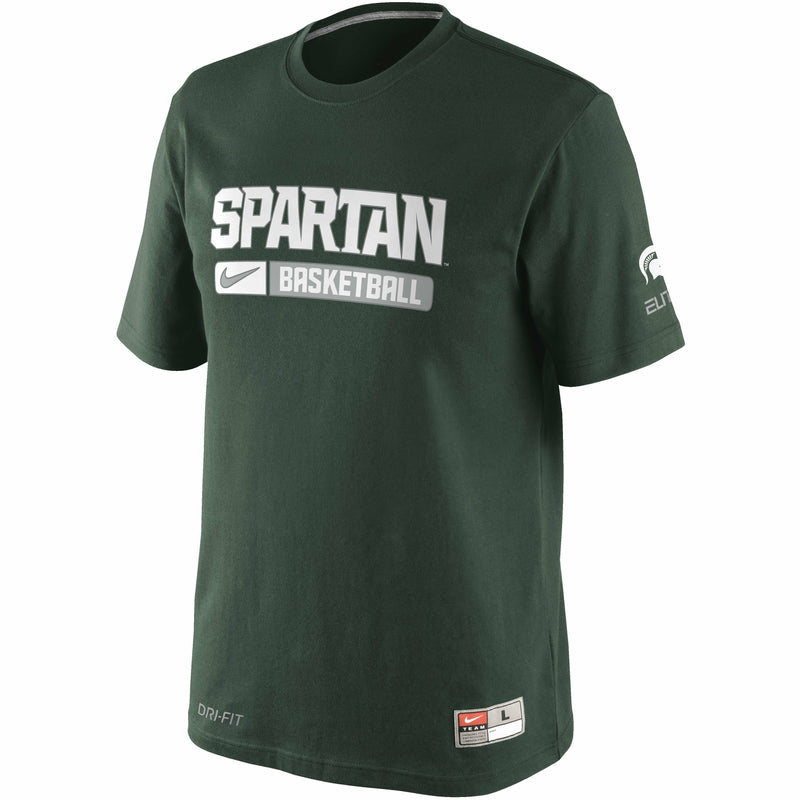Forest green crewneck short-sleeve t-shirt. On the left sleeve is a small white Spartan helmet over gray text reading Elite. On the center chest, all caps text reads Spartan over a gray bar with white text reading basketball. Next to the gray bar is a white block with a gray Nike swoosh.