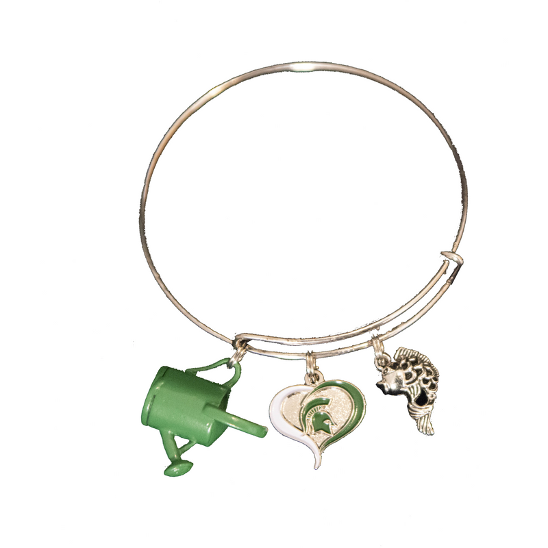 Silver bangle-style bracelet with three charms. From left to right: a green watering can, a silver heart with a green outline and a green Spartan helmet in the center, and a silver koi fish.