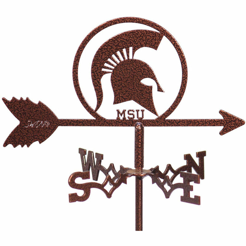 Close-up of the copper weathervane's top, which above the arrow has a circle containing a Spartan helmet. Below the arrow is a four-directional extension with letters indicating North, East, South, and West, respectively.