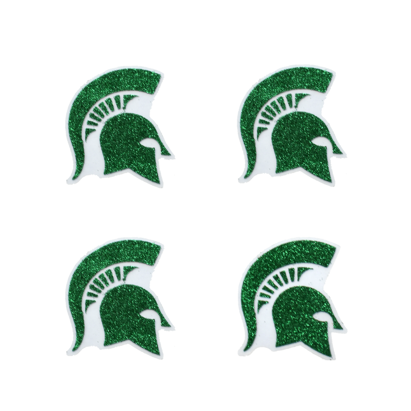 Four green glitter stickers in the shape of Spartan helmets, each with a slight outline that appears clear when on skin