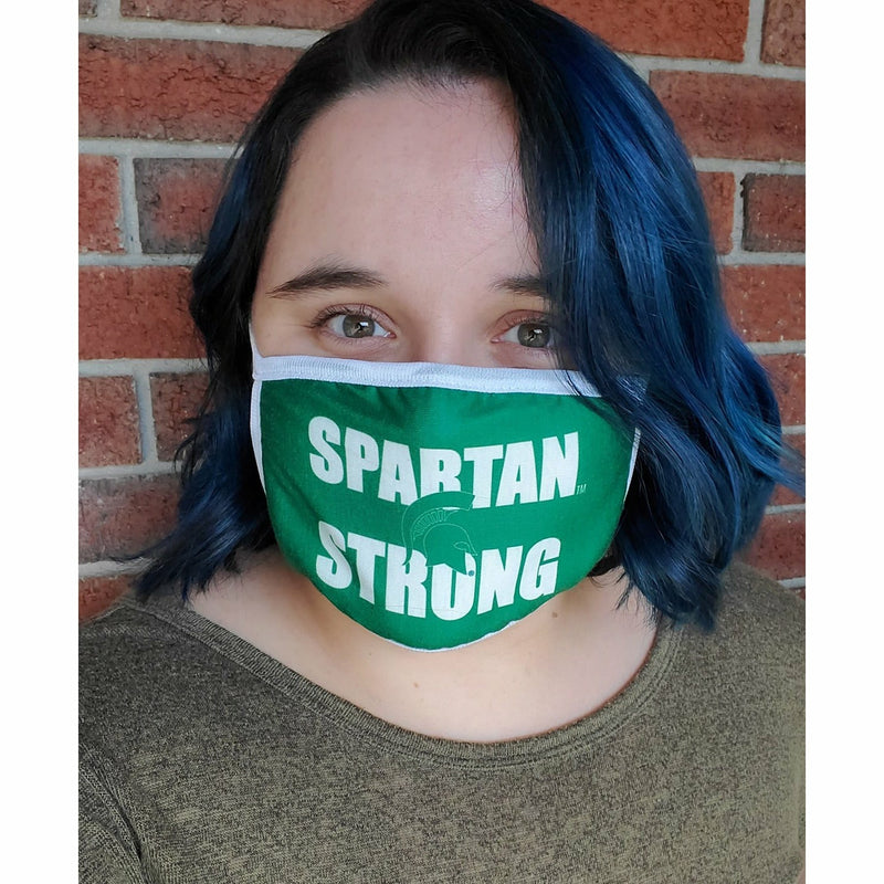Woman wearing the Spartan Strong face covering, which completely covers the lower half of her face.