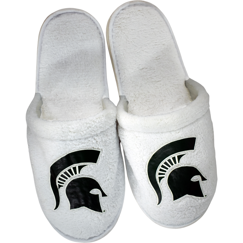 White mule-style slippers with a terrycloth texture. On the center of each toe piece is a forest green Spartan helmet print