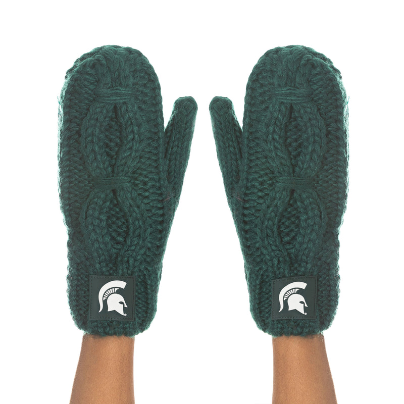 Two arms with dark green cable knit mittens covering the hands. Mittens have a green patch printed with a white Spartan helmet at each wrist