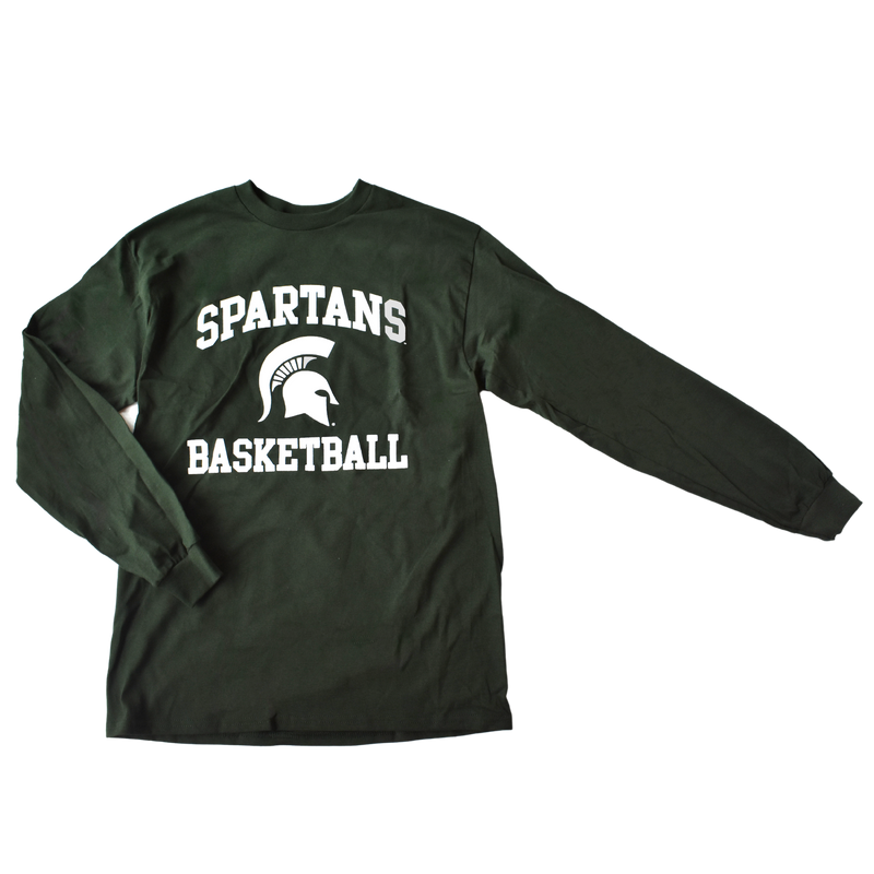 Forest green long-sleeve t-shirt with white printing centered on the torso. Around a Spartan helmet is two lines of block text: a curved line above reading Spartans and a straight line below reading Basketball