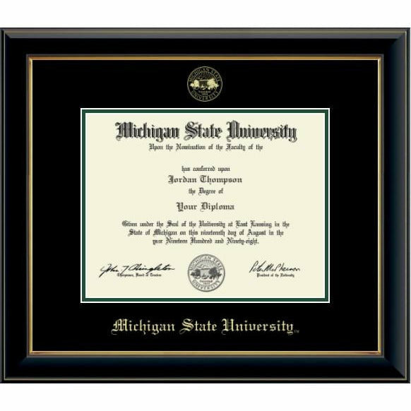 MSU diploma inside a thin strip of gold mat. Top black mat is embossed with the university seal at the top and old English style font reading "Michigan State University" at the bottom, both in gold. Frame is a shiny black lacquered wood with gold trim inside