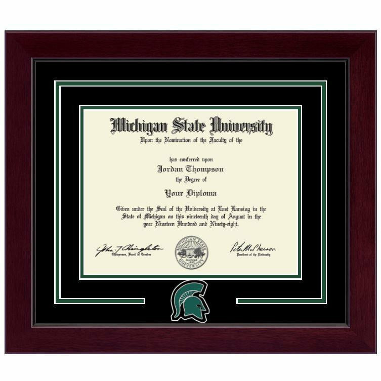 MSU diploma inside a thin strip of dark green mat. Top black mat is embossed a green and white stripe encircling the frame, and a green Spartan helmet logo at the bottom. Frame is a very dark reddish wood